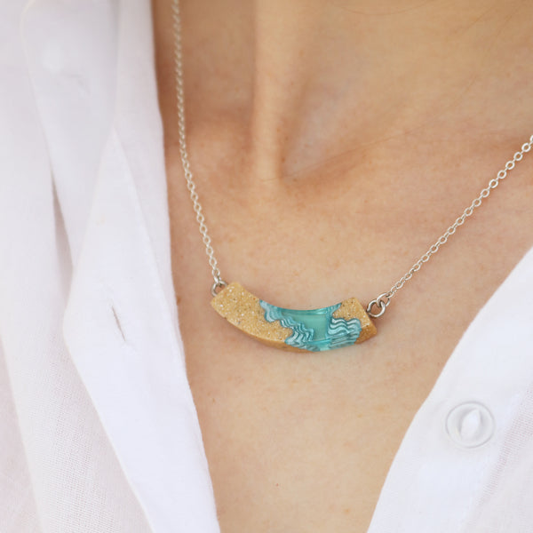 Headland Necklace – Aqua Resin & Sand Coastal Arc Pendant by BoldB
