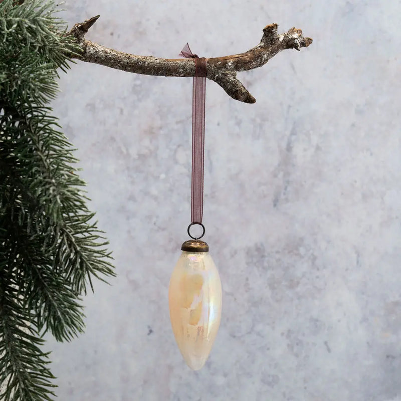 2" Alba Luster Conical Glass Christmas Ornament with a bronze cap and pink organza ribbon, hanging from a branch with a frosted pine branch in the background.