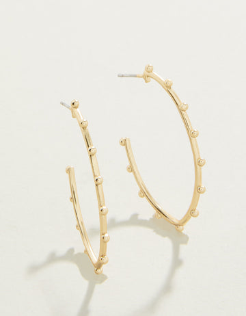 Bobbi Hoop Earrings in matte 18kt gold with textured design.