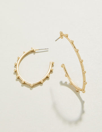 Bobbi Hoop Earrings in matte 18kt gold with textured design.