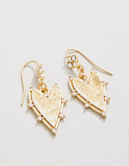 Noble Heart Earrings featuring heart-shaped design with glass crystals and 18kt matte gold plating.