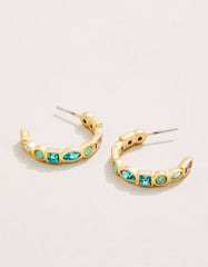 Shine Bright Hoop Earrings in Sea Foam featuring 18kt matte gold plating and colorful glass gems.