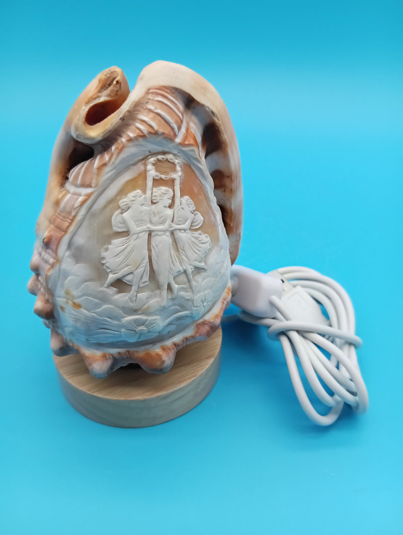 4" carved cameo décor light with USB cord on wooden base