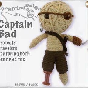 Handmade Captain Bad String Doll Keychain featuring a pirate design with fabric tag and lobster clasp.