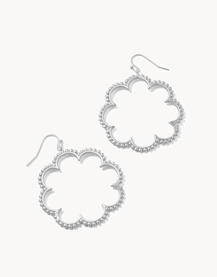 Dotted Daisy Earrings in sterling silver with petal-shaped design.