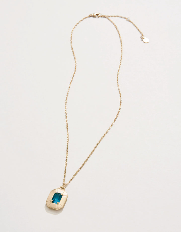 Chateau Necklace in Navy with faceted dark blue glass stone and 18kt matte gold plating.