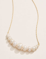 Paragon Pearl Necklace with freshwater pearls on a thin 18kt matte gold-plated chain.