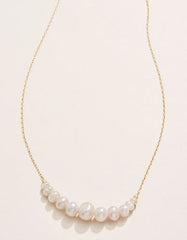 Paragon Pearl Necklace with freshwater pearls on a thin 18kt matte gold-plated chain.