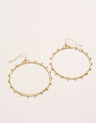 Bobbi Earrings featuring textured 18kt matte gold-plated hoops.