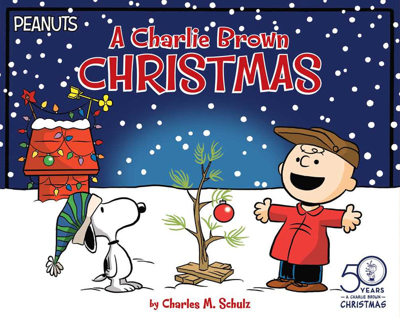 Cover of 'A Charlie Brown Christmas' with Snoopy and Charlie Brown in a snowy scene.