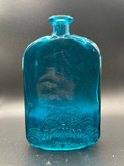 The Aqua Bottle under a light.