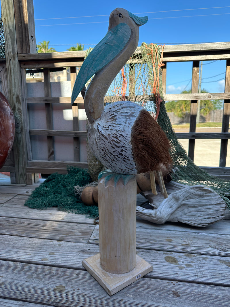 Coconut Pelican Statue with Coconut Body and Wooden Neck in Aqua. Handmade and unique.