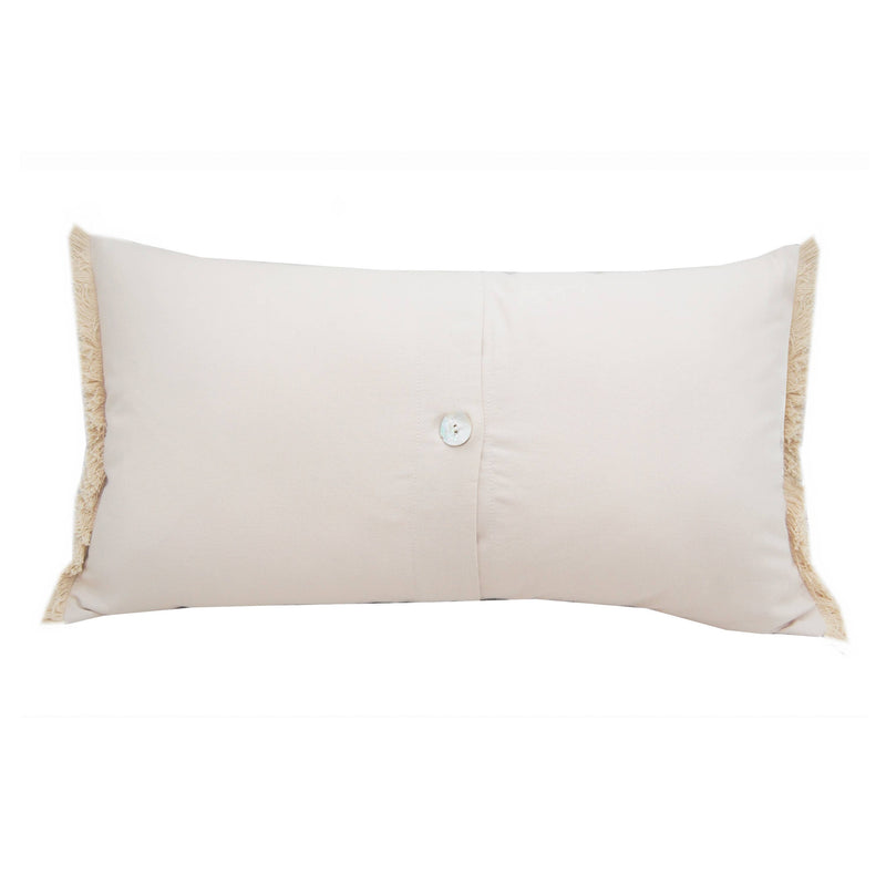 Back view of the Flamboyance Lumbar Pillow with a soft beige envelope-style closure and fringed edges.