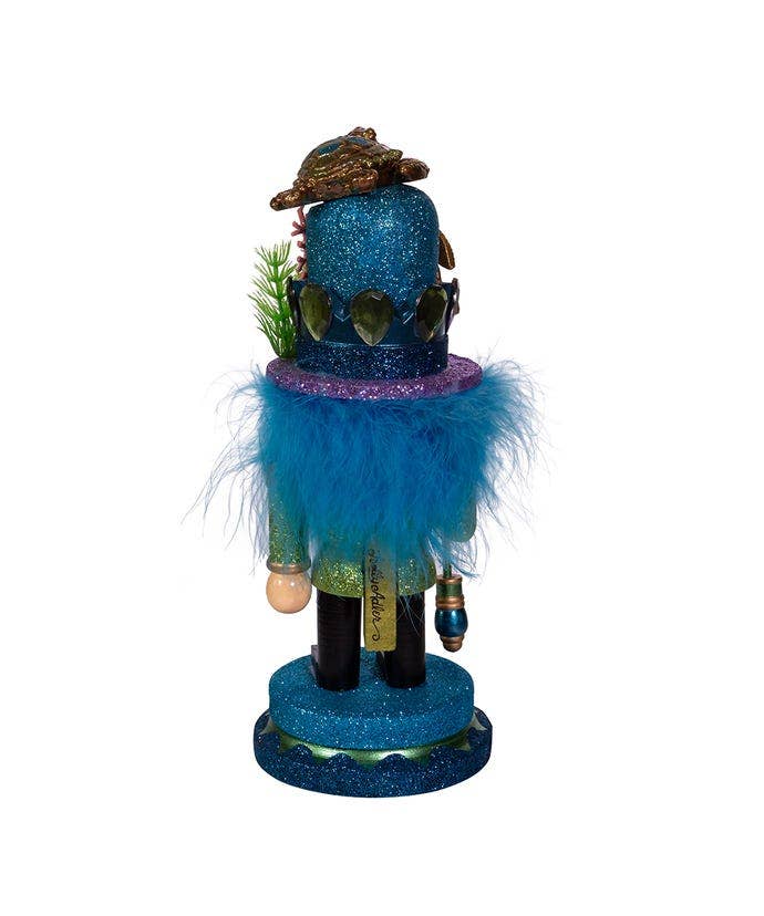 Christmas nutcracker in coastal style with sea turtle hat – seasonal holiday decoration