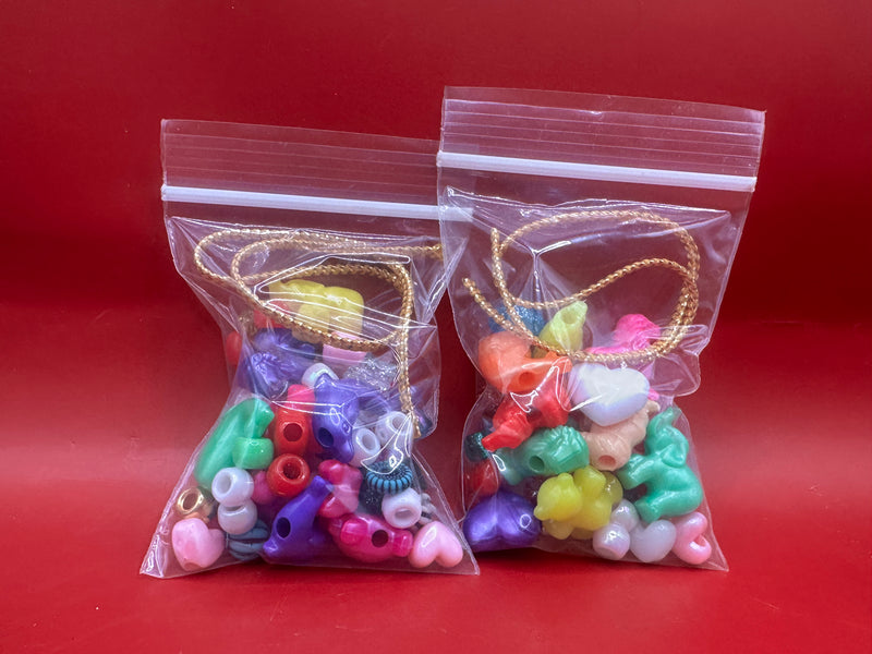 Bag of assorted beads with cord – DIY bracelet kit