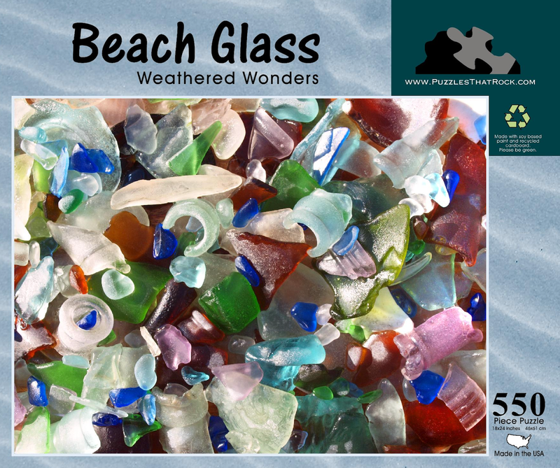 Front view of the Beach Glass: Weathered Wonders 550-piece jigsaw puzzle box, featuring vibrant sea glass pieces on the cover.