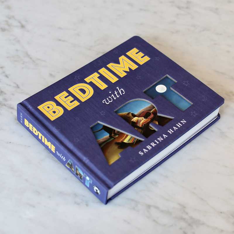 Book titled 'Bedtime with' by Sabrina Hahn on a marble surface