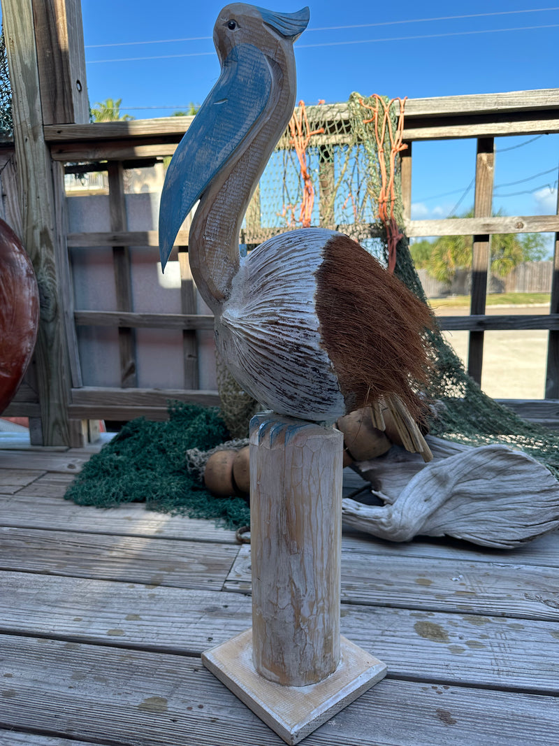 Coconut Pelican Statue with Coconut Body and Wooden Neck in blue. Handmade and unique.