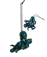 Blue resin octopus ornament with detailed tentacles and hanging cord, assorted coastal designs.