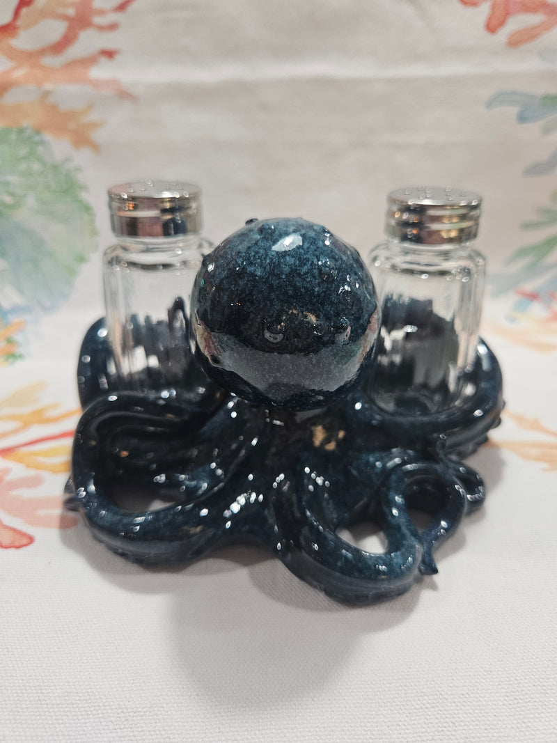 Blue ceramic octopus salt and pepper shakers set with detailed texture and coastal design.