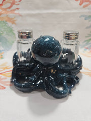 Blue ceramic octopus salt and pepper shakers set with detailed texture and coastal design.