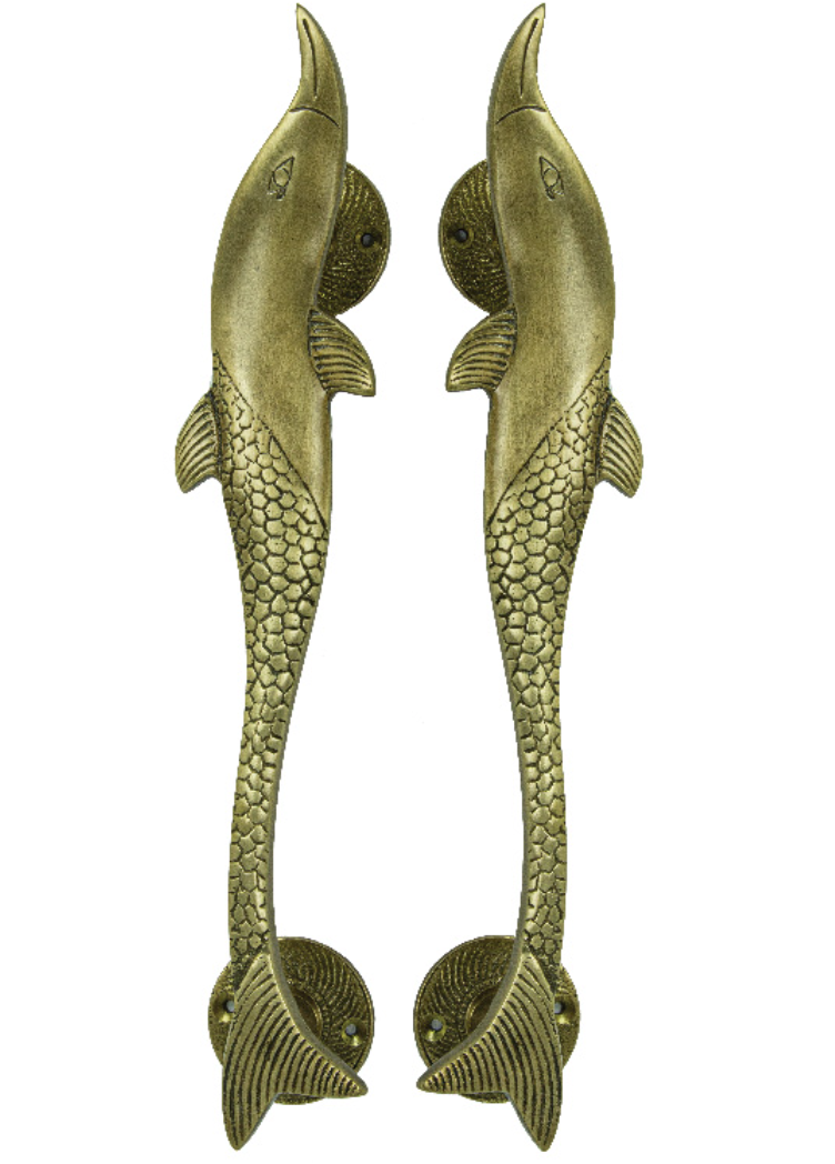 Pair of solid brass dolphin-shaped door handles with textured scale detailing and polished finish.