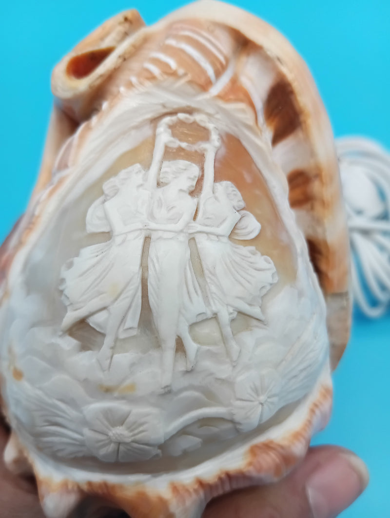 Carved cameo décor light showing detailed relief carving of Three Graces