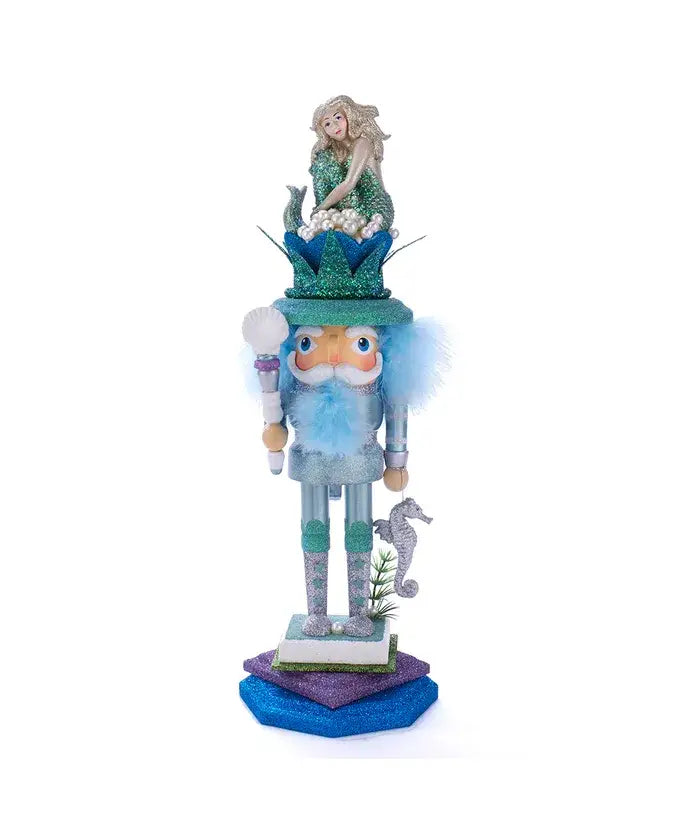 coastal nutcracker with green and turquoise glitter, mermaid hat and seahorse on base