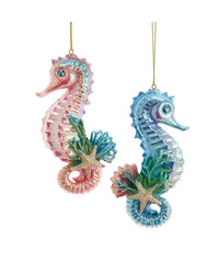 Two colorful seahorse ornaments with starfish on a white background