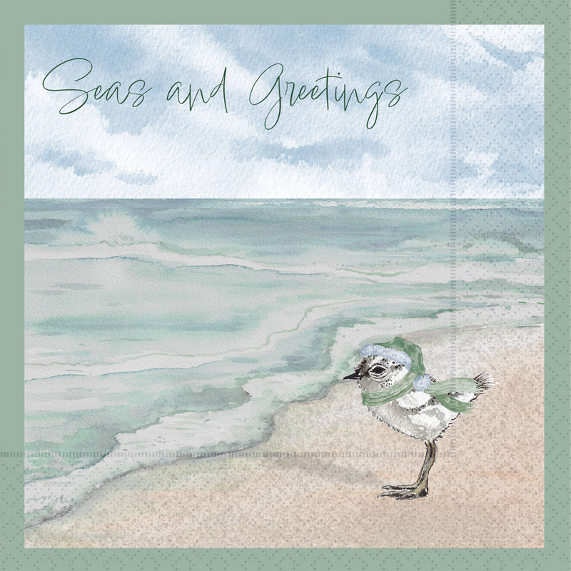 Card with a bird on a beach and 'Seas and Greetings' text