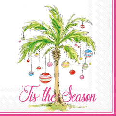 Napkin with a palm tree decorated with Christmas ornaments and 'Tis the Season text.