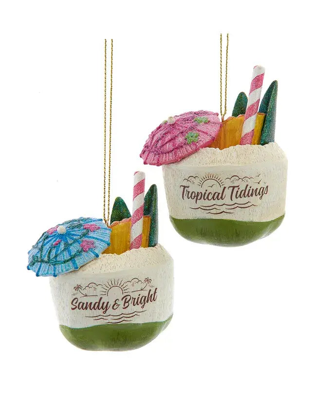 Two decorative beach-themed ornaments with 'Tropical Tidings' and 'Sandy & Bright' text on a white background.