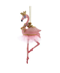 Decorative flamingo ornament with a crown and tutu on a white background