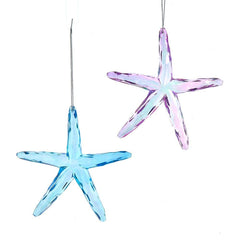 Two star-shaped ornaments, one blue and one pink, on a white background.