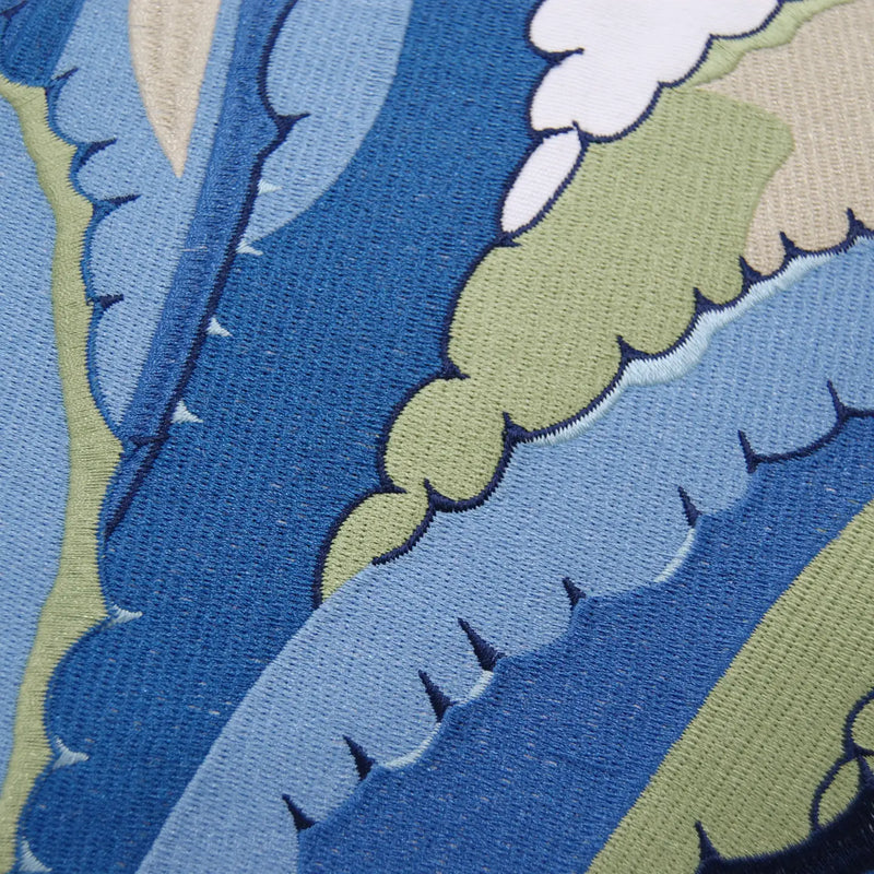 Close-up of the intricate blue agave design on the Agave-Tequila Maker Pillow, highlighting its detailed craftsmanship.