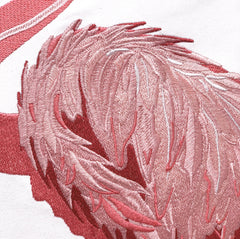 Close-up of the intricate flamingo embroidery with gold and silver accents on the Flamingo Fancy Pillow.