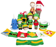 Collection of crocheted Christmas-themed items including dolls, a mug, and coasters on a white background.