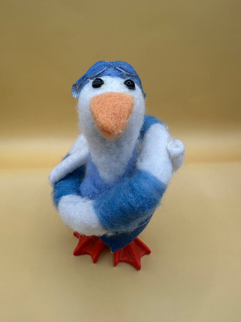 Felted wool swimming duck figurine in coastal style – front view