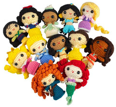 Collection of colorful crochet dolls resembling various characters on a white background