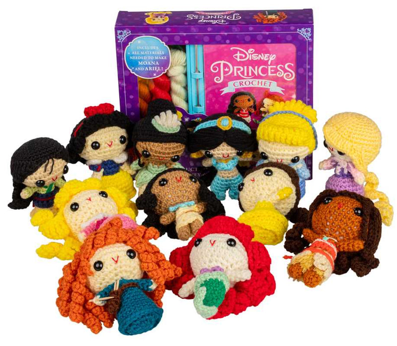 Collection of Disney Princess crochet dolls in front of a Disney Princess crochet kit box.