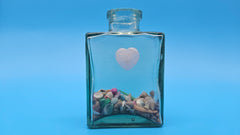 Heart-accented coastal glass bottle – perfect for beach cottage styling