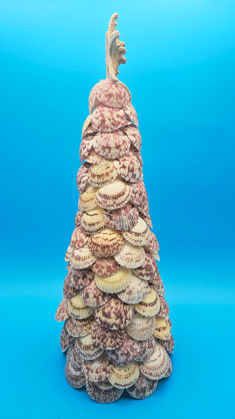 Detailed view of handcrafted scallop shells showing texture and color variations.