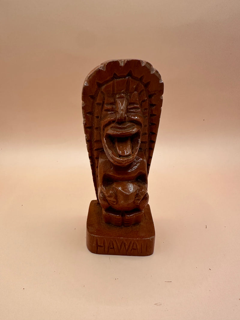 Front view of the Hawaii Tiki God of Strength Ku wooden statue with detailed carving and "Hawaii" engraved on the base.