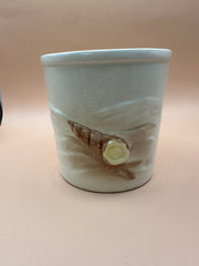 Back view of Vintage Shell Ceramic Planter featuring a conch shell design.