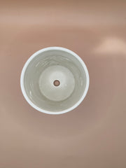 Top view of Vintage Shell Ceramic Planter with visible drainage hole.