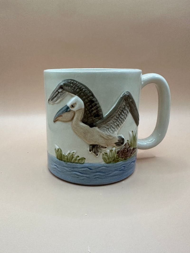 Vintage Pelican Mug front view with 3D pelican in flight design