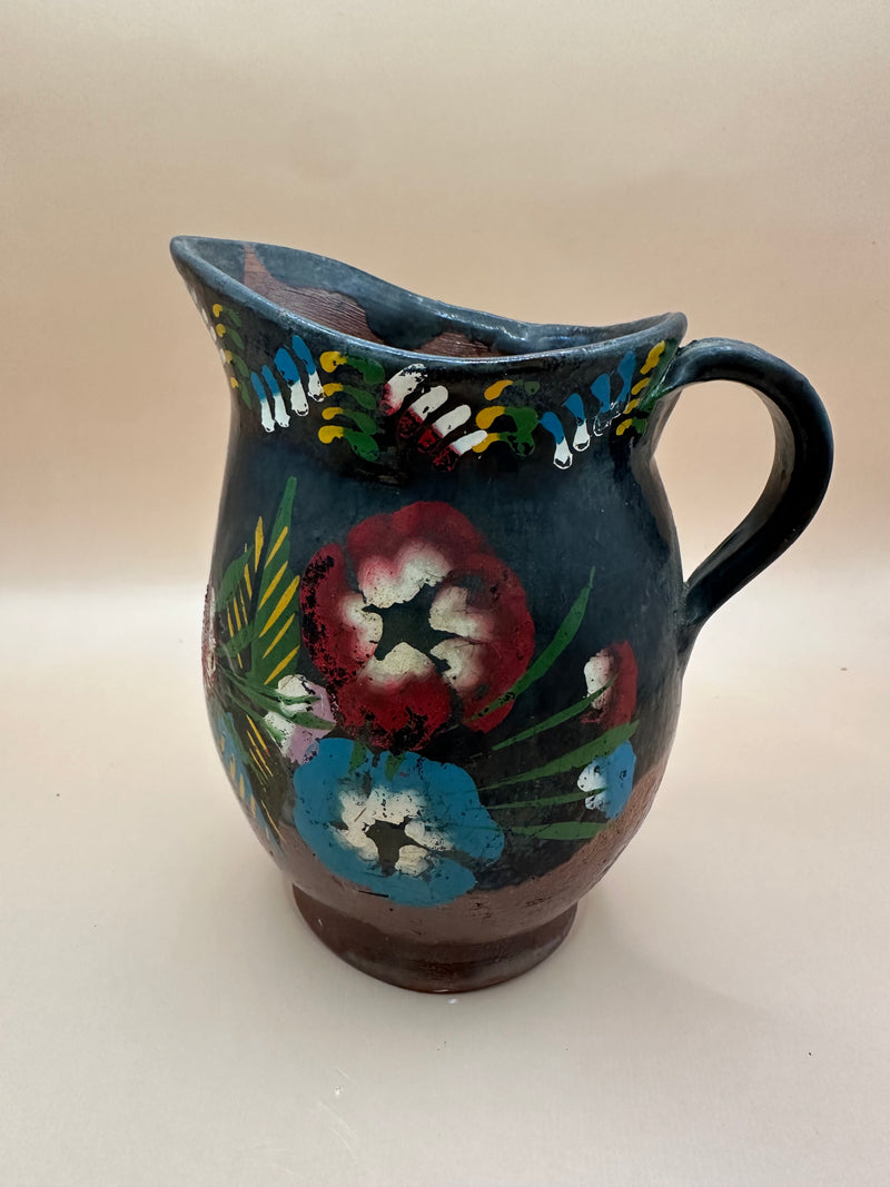 Image of a Vintage Handmade Ceramic Pitcher with a hand-painted floral design.