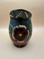 Front view of the Vintage Handmade Ceramic Pitcher showcasing floral detailing.