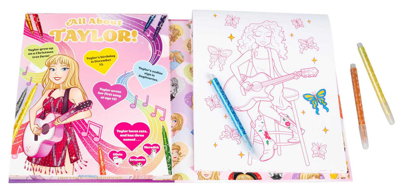 Coloring book with a Barbie-themed cover and coloring pages featuring a girl with a guitar, surrounded by colorful markers.