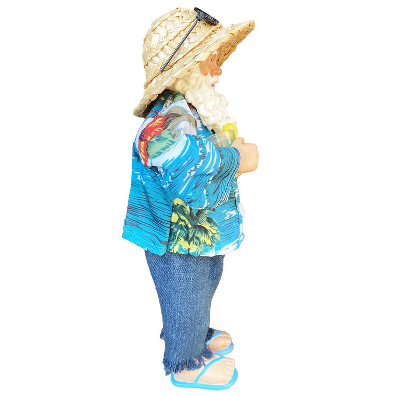 Side angle of Santa figurine wearing straw hat blue shirt and flip flops holding red drink coastal Christmas décor